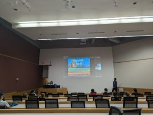 Lecture hall watching presentation given by a Six Flags Corporate professional