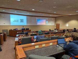 Lecture hall watching presentation given by a Walt Disney Imagineer
