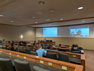 Lecture hall watching presentation given by a Walt Disney Imagineer