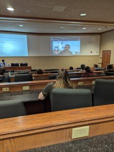 Lecture hall watching presentation given by a Walt Disney Imagineer