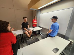 Build Team Members discussing potential project ideas